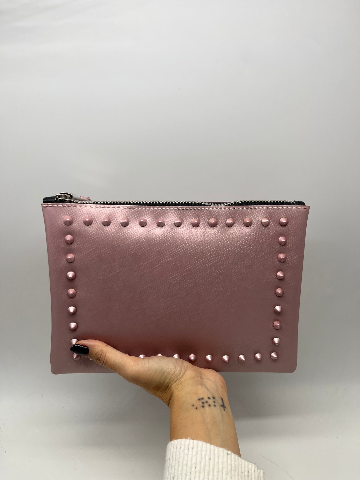 Pochette gommata borchie