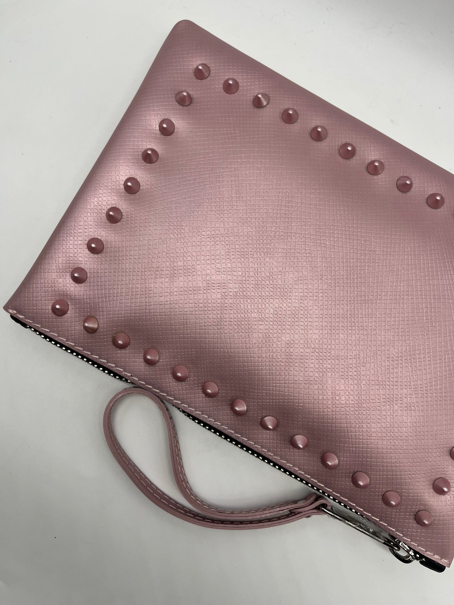 Pochette gommata borchie